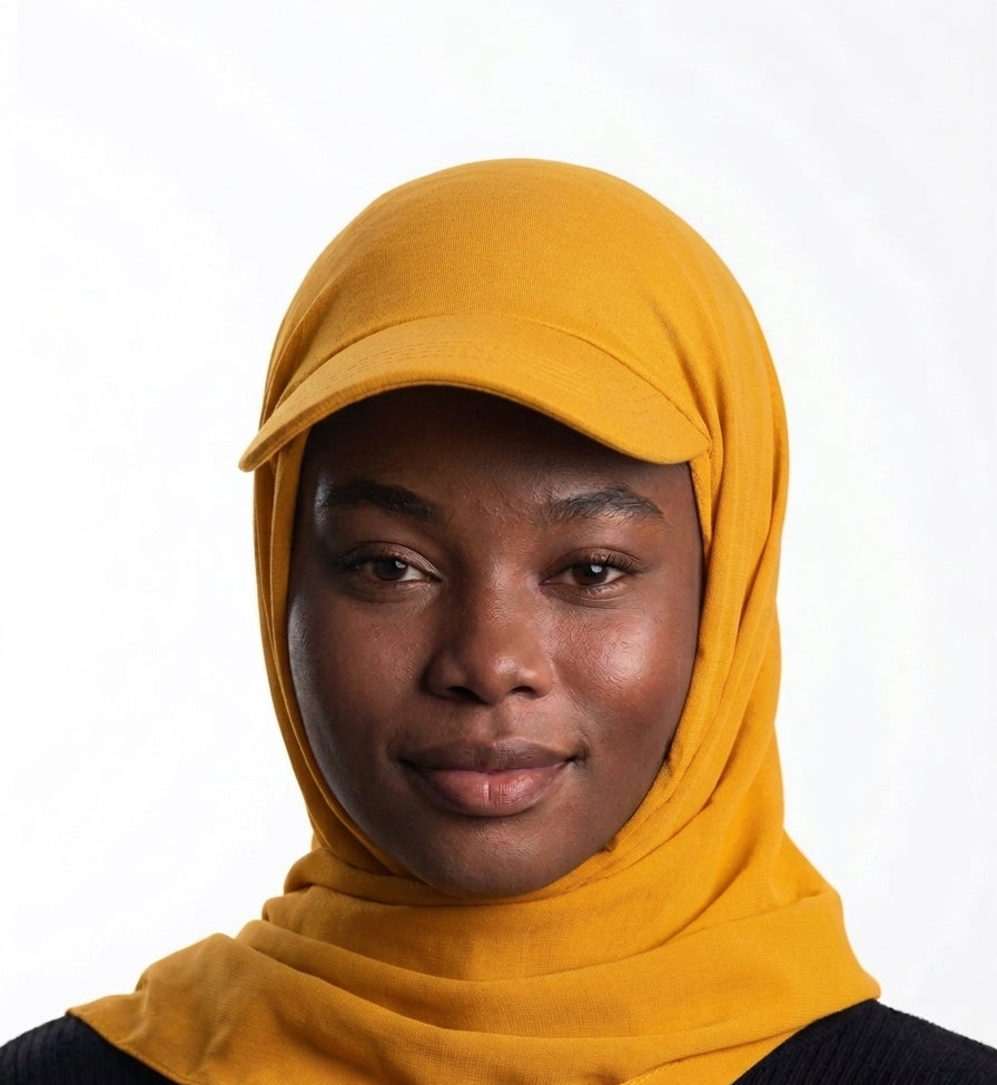 Woman wearing a mustard yellow Baseball Cap Hijab Scarf by Head and Extra