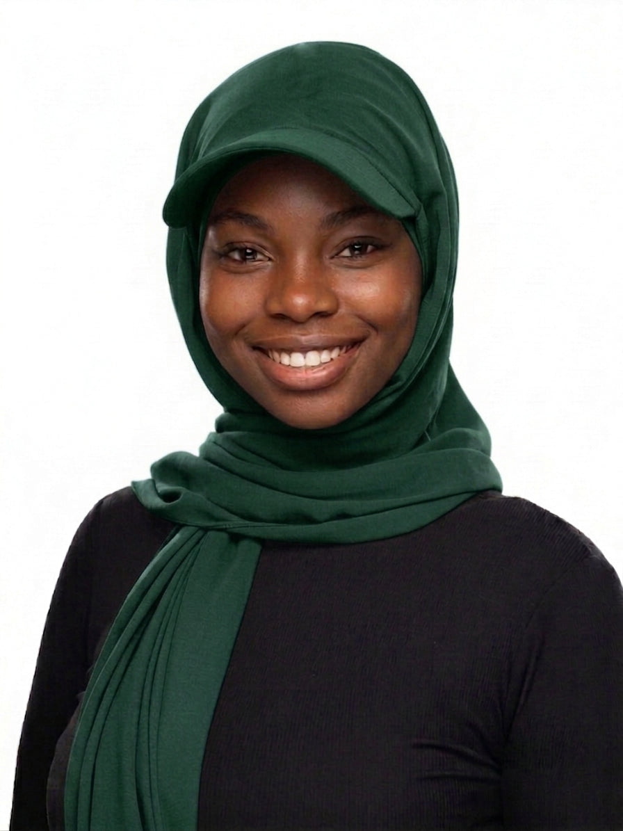 Woman wearing an emerald green Baseball Cap Hijab Scarf by Head and Extra