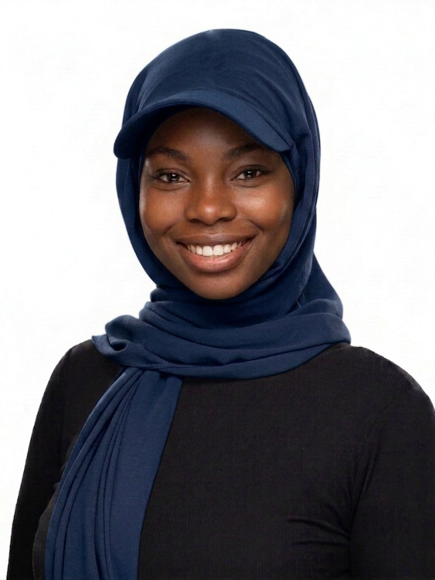 Woman wearing a navy blue Baseball Cap Hijab Scarf with built-in cap brim