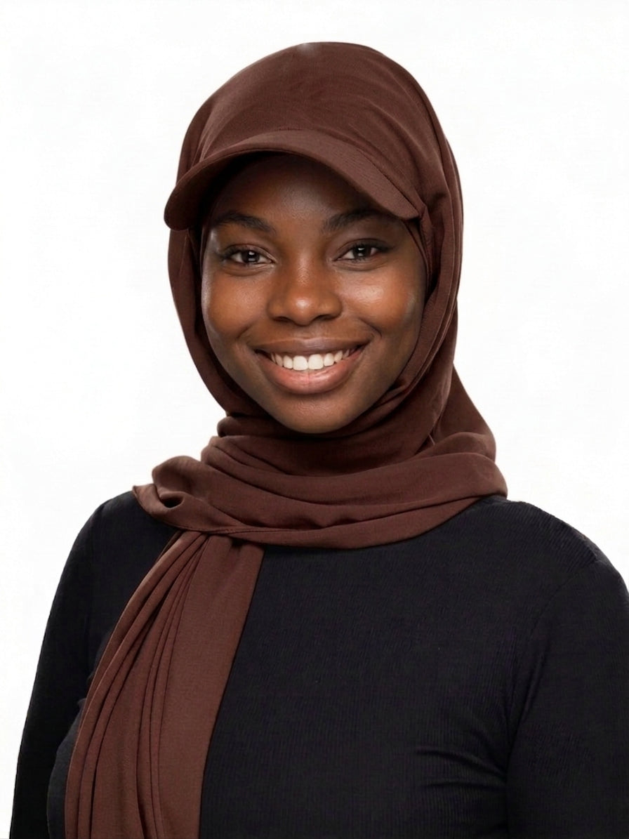 Woman wearing a brown Baseball Cap Hijab Scarf with built-in cap brim